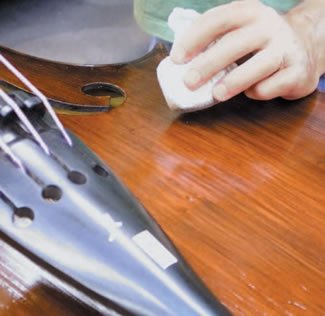 Wiping your bass down after use to remove rosin from its top will keep it looking good.